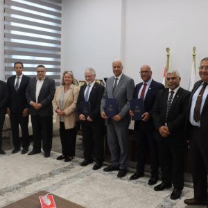 Signing a memorandum of understanding in initials with Abertay University and Al Maktoum College of Postgraduate Studies in Scotland